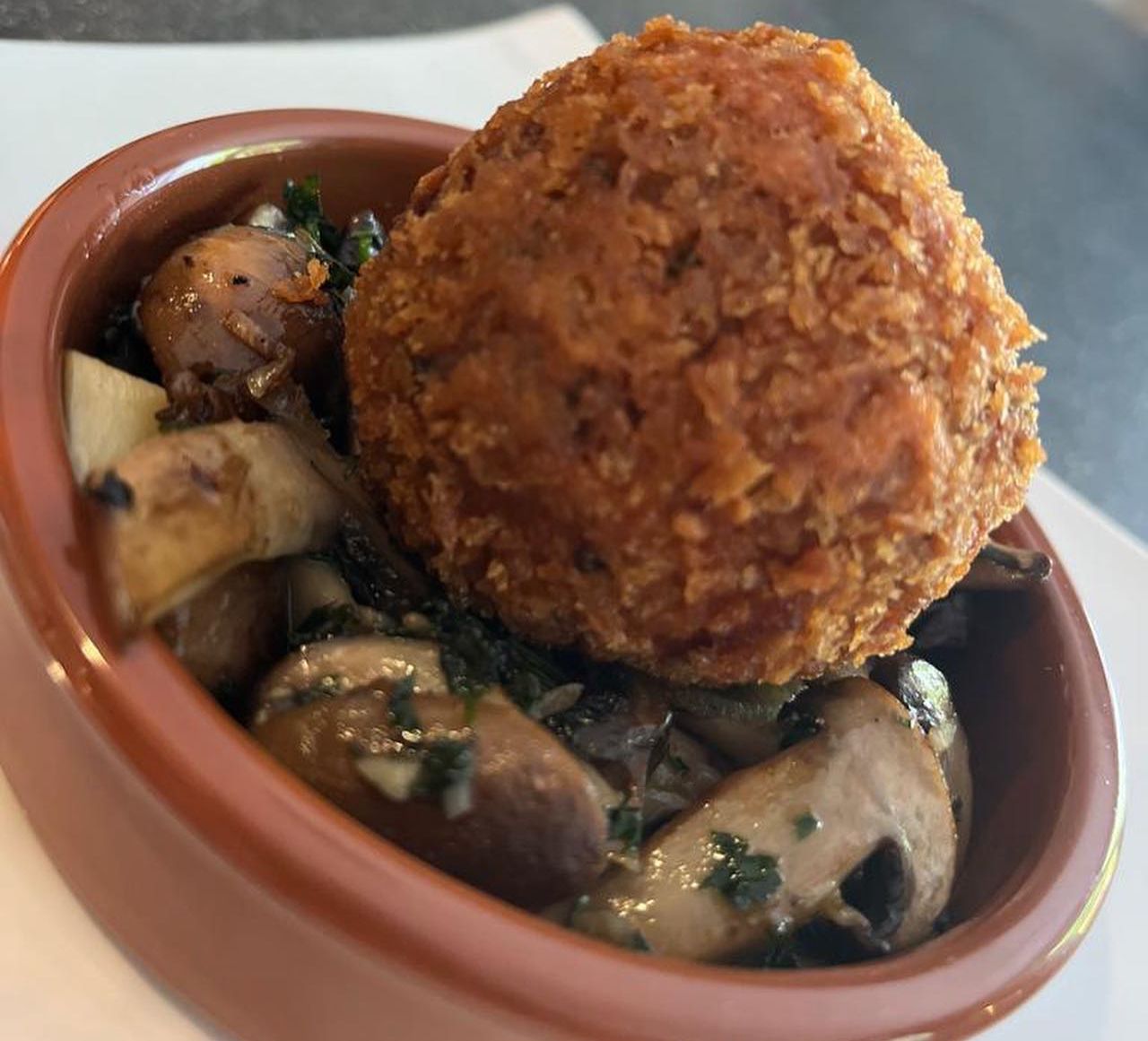 Mozzarella Arancini served on a bed of Garlic Mushrooms at Anelli Hotgel in Southport