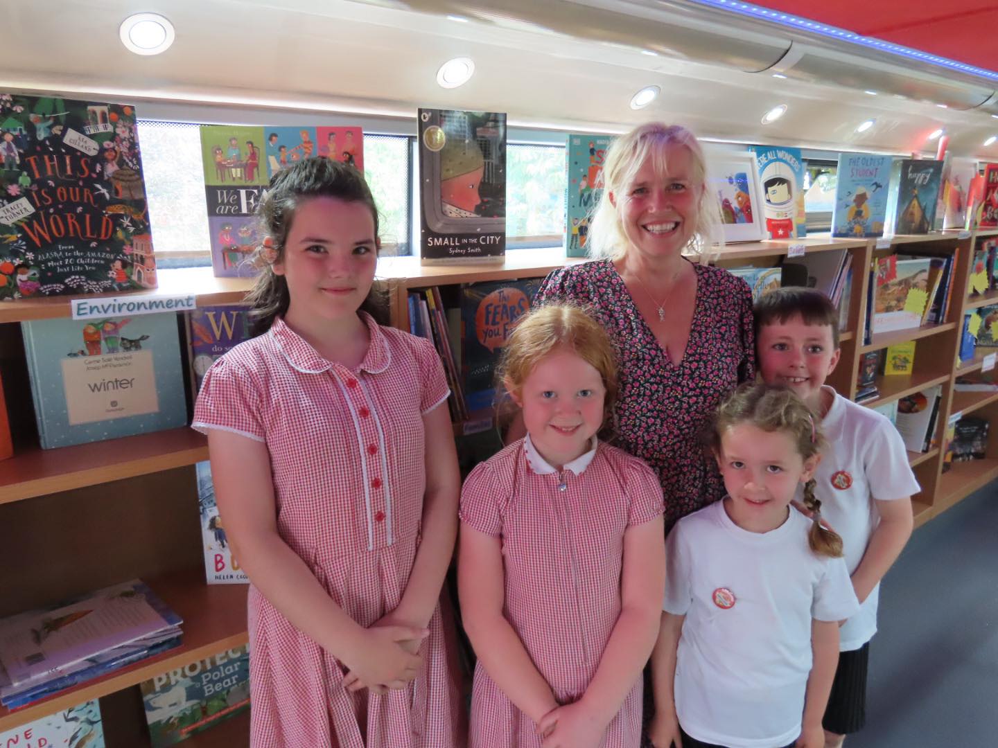 The Big Bus at Marshside Primary School in Southport. Deputy Headteacher Lynda McKenna with Reading Ambassadors Lexi-Mae, Ada, Betsy and Finlay. Photo by Andrew Brown Media