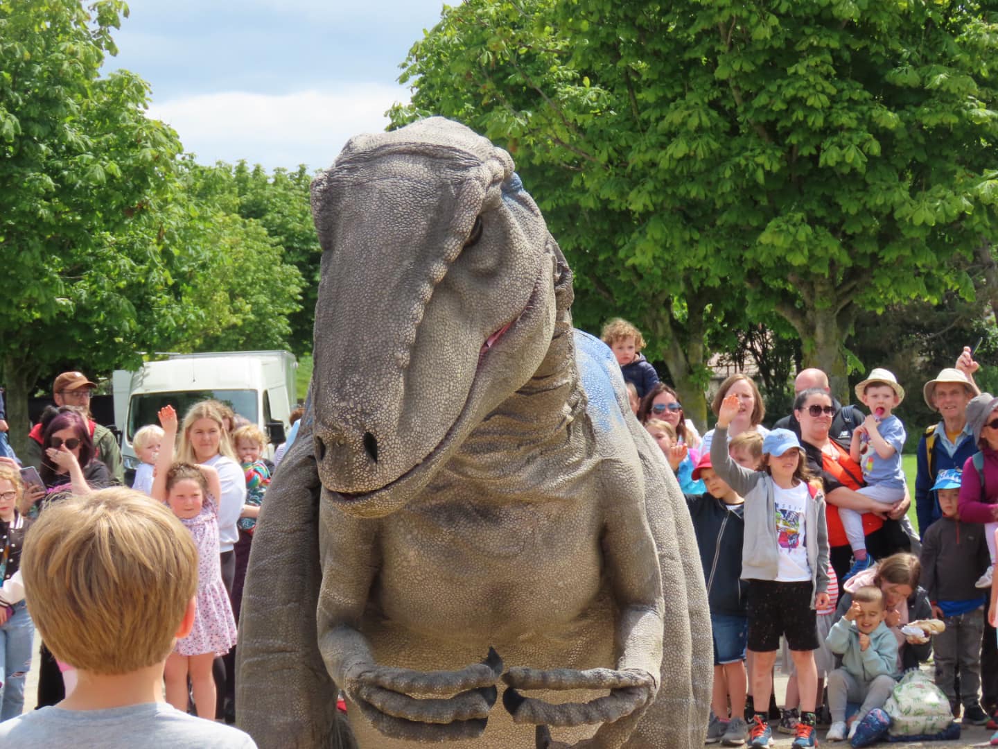 Dinosaurs from Jurassic Live at The Far Away Land Festival at Victoria Park in Southport. Photo by Andrew Brown Media