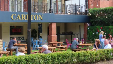 The Carlton bar in Southport reopens with a new look, new beer garden – and a huge giraffe