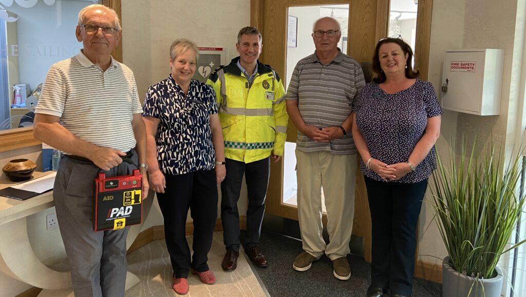 Sailings Home Owners and Staff with Jonathan Cunningham and their new defibrillator. Photo Left to right Peter Dalton (Home Owner), Yvonne Hodge (Duty Manager), Jonathan Cunningham (CFR Team Leader), Colin Redwood (Home Owner) and Karen Chicken (General Manager)