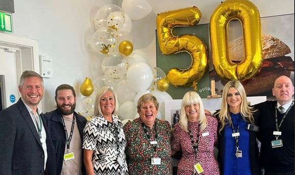 Customer Assistants June Blakeley and Pamela Till have celebrated working for 50 years at the Marks & Spencer store in Southport town centre. Left to right: Pete Dobson (Regional Manager), Adam Whittaker (Store Manager), June Blakeley, Helen Milford (Stores Director), Pamela Till, Emily Till (Visual Manager and Pams daughter), James Lundon (Team Manager)