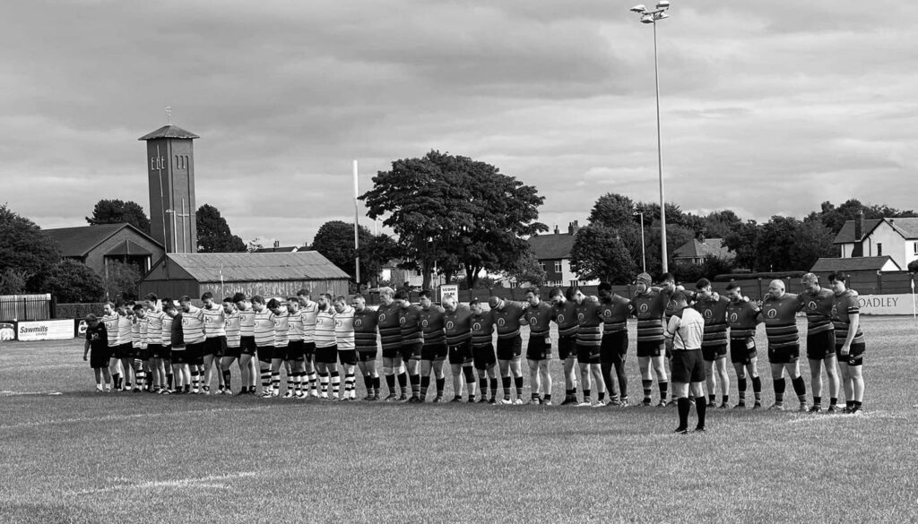 Southport Rugby Club players took part in an Impeccable moment of silence for Her Majesty Queen Elizabeth II before kick off at Waterloo Road