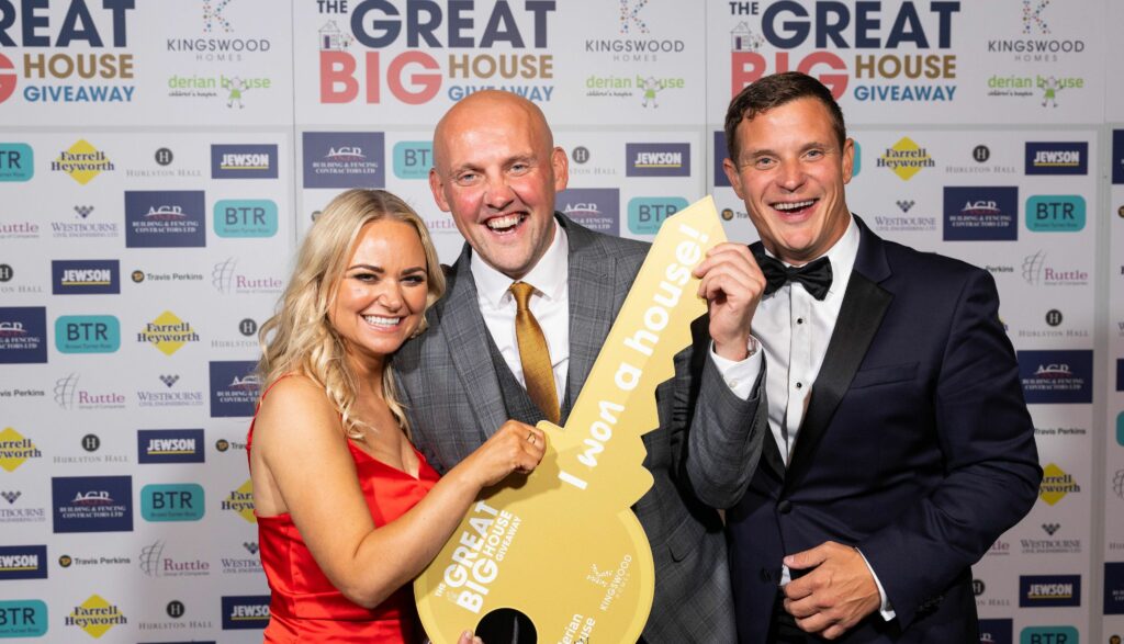 Caroline Taylor, Head of Income, Marketing and Communications at Derian House Childrens Hospice, Charles Maughan (winner), Paul Jones, Managing Director of Kingswood Homes at the ball