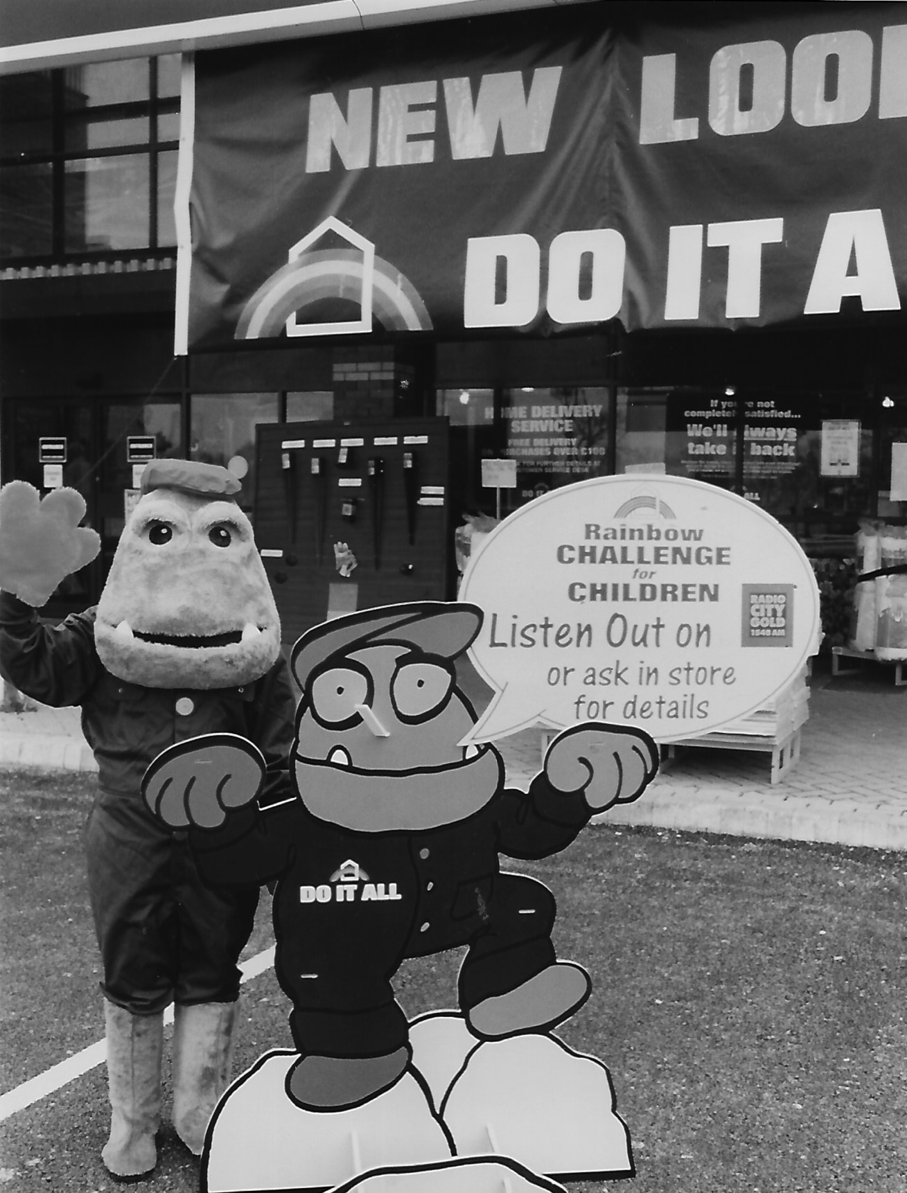 Southport in November 1994. The former New Look Do It All store in Southport, with two characters promoting a Rainbow Challenge for Children event