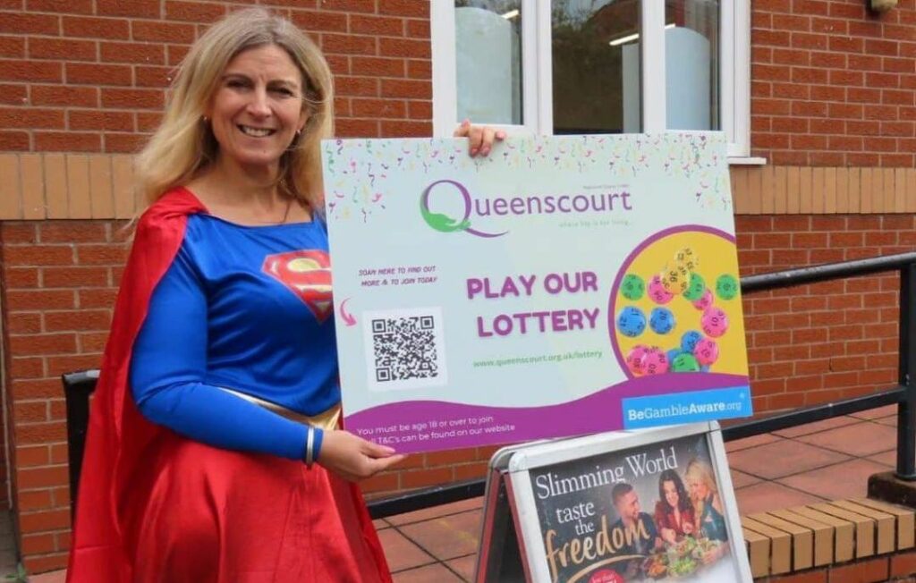 Southport Slimming World Consultant Dee Wright supports Queenscourt Lottery. Photo by Andrew Brown Media