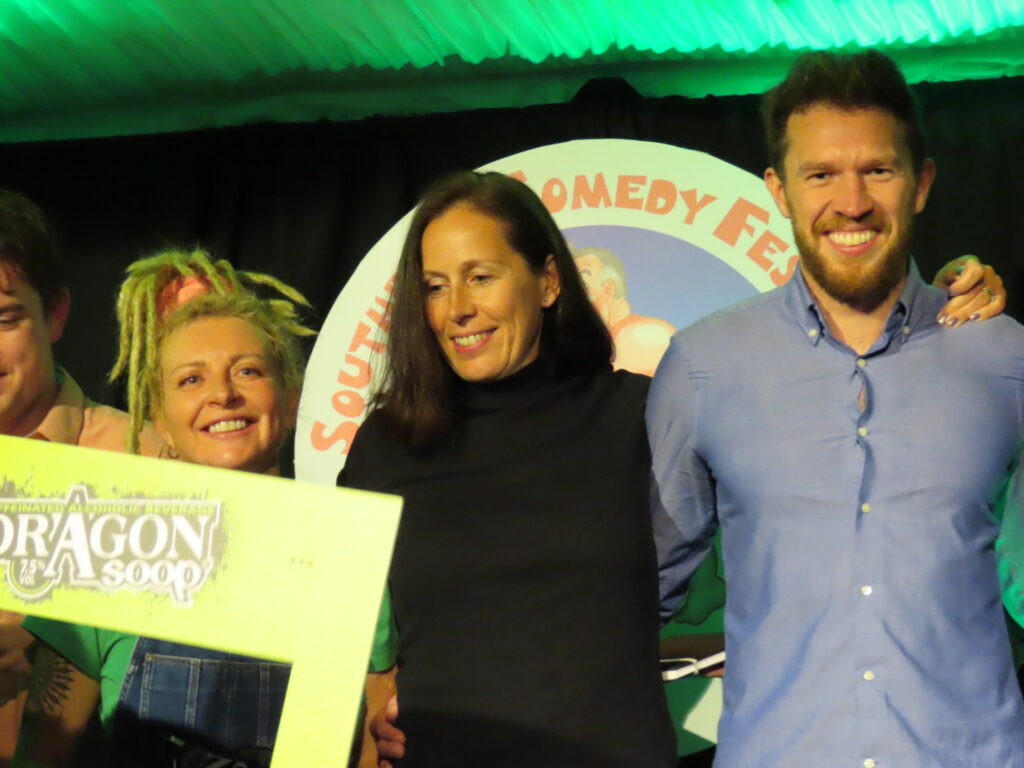 Contestants wowed the audience at the 2022 Southport New Comedian of the Year competition. Winner Sam,antha Day (left), with finalist Andy Roach (right) and Caroline Constable from sponsors Dragon Soop. Photo by Andrew Brown Media