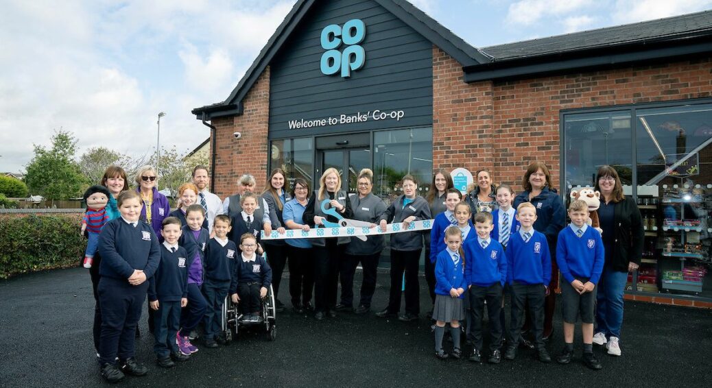 Co-Op Banks. Picture shows manager Helen Faichney, centre with scissors and L-R: Paula Ryding of Little Treasures Toddler Group, teachers Julie Layton and Stephen Draper and pupils from Banks Methodist Primary School, Allison Foy, Molly Pendleton, Linda Johnson, Lianne MacDonald, Michelle Hopgood and Rachel Brown from the Co-Op teachers Sarah Jacka and Joanne Owen with pupils from Banks St. Stephens Church of England Primary, and Julie Dunning of Little Treasures Toddler Group