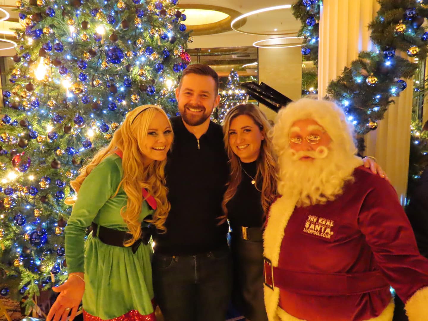 The Christmas lights switch on has taken place at The Grand on Lord Street in Southport. Claire Simmo (left), Shaun McMahon (sedond left), Kelly Bond (third leff) and Father Christmas. Photo by Andrew Brown Media