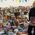 Captain Alison Hutchings with gift donations that The Salvation Army in Southport has received through its Christmas Present Appeal