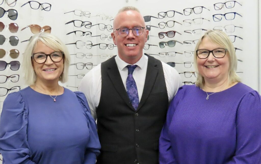 Crystal Clear Opticians in Southport. Neil Mattack with Paula McKeown (left) and Marta Garrod (right). Photo by Andrew Brown Media