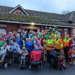 The Rivington Barn Bikers with Derian House's young people outside the hospice