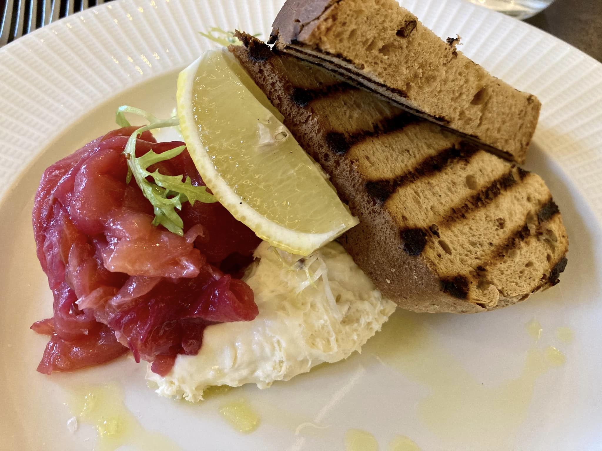 Christmas at The Grand in Southport. Gin cured salmon with horseradish cream and brown bread 