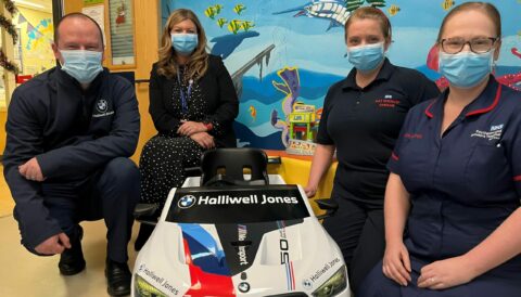 Children at Ormskirk Hospital can drive to medical procedures in BMW ride on car from Halliwell Jones Southport