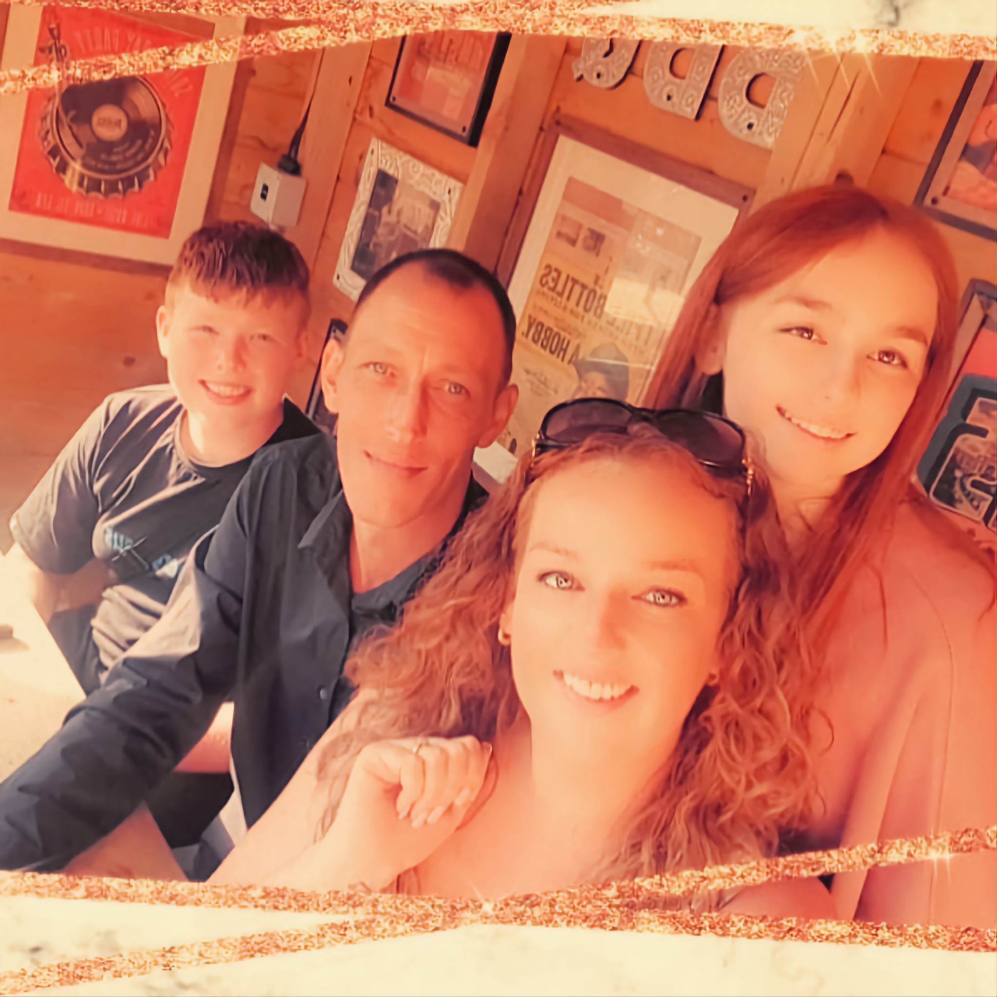 Lewis Wright (left) and his family before his nightmare began. He is pictured with mum Kayleigh, his sister Caitlin and his stepdad Stuart