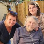 Acclaimed Southport artist Malcolm Fryer with daughters Juliet and Katie