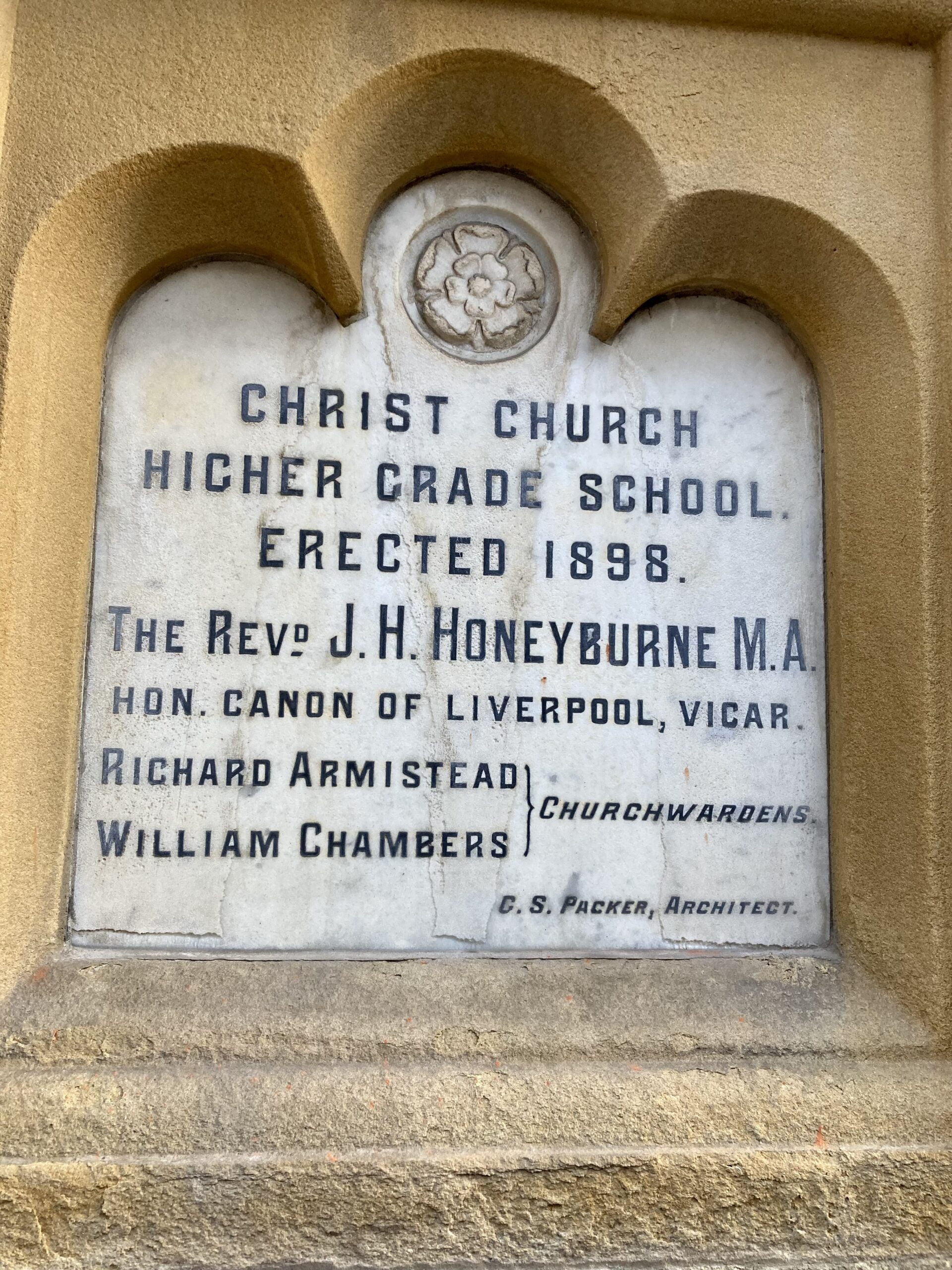 The stone celebrating the former Christ Church School, now the Techedia offices at the Cloisters Building on Corporation Street in Southport town centre. Photo by Andrew Brown Media