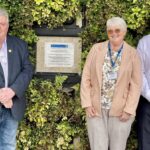Cllrs Fairclough, Maher and McKee with the memorial plaque dedicated to Gordon Friel