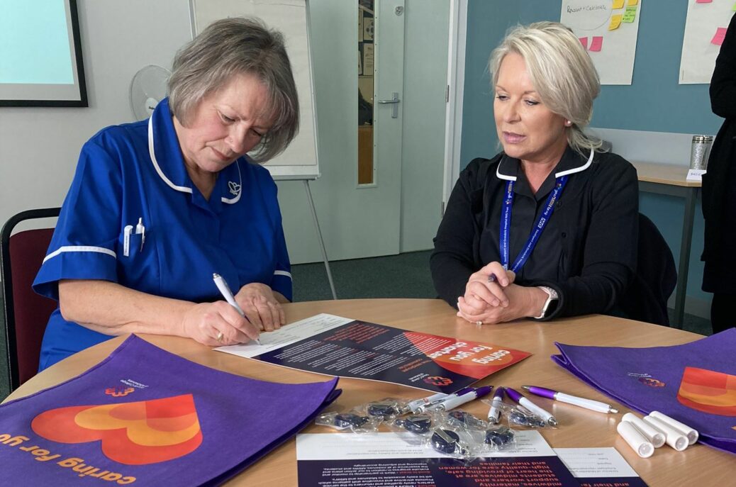 Dawn Meredith, right, signs the Caring For You Charter with Robin Rootes, the Royal College of Midwives Health and Safety representative