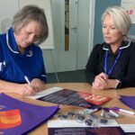 Dawn Meredith, right, signs the Caring For You Charter with Robin Rootes, the Royal College of Midwives Health and Safety representative