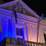 Southport Town Hall is lit up in the colours of the Ukraine flag to commemorate one year since the invasion by Russia. Photo by Andrew Brown Media