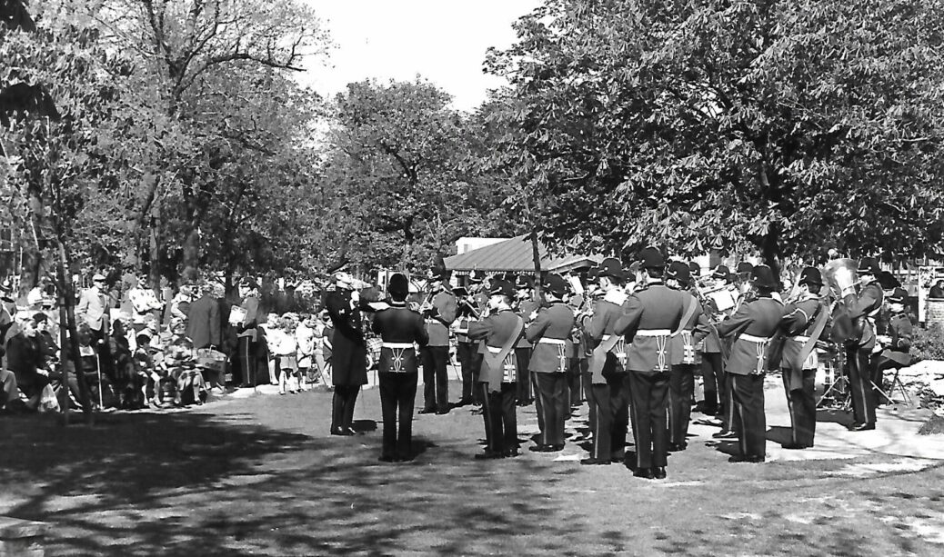 A band plays in front of a large crowd at Hesketh Park in Southport in May 1982