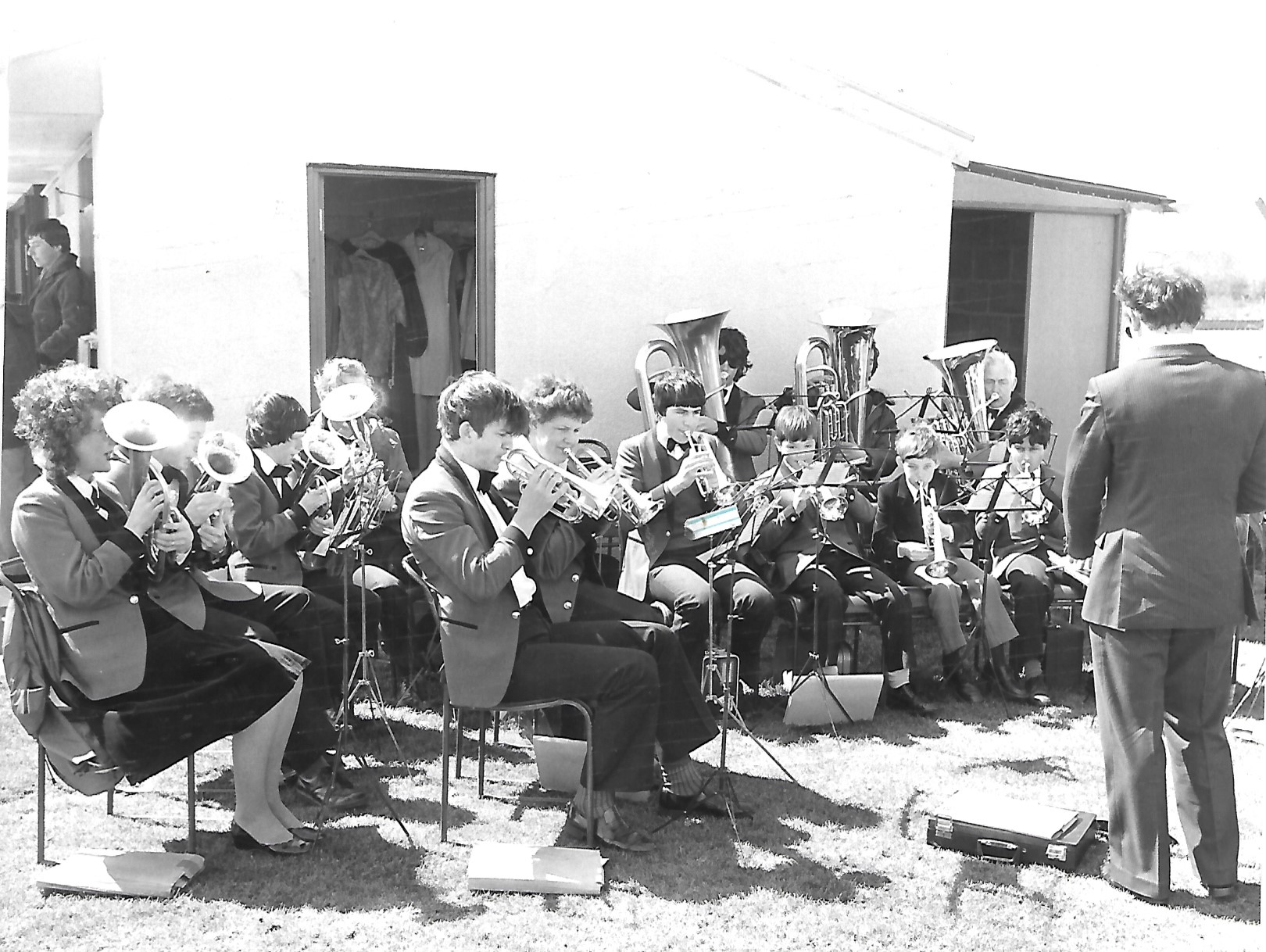 A brass band performs for visitors to the Crossens May Fair in Southport in 1982