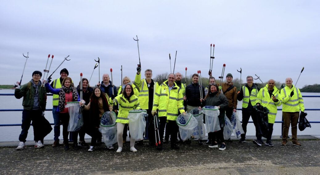 The teams behind the Marine Lake Events Centre project came together to help clean up and remove litter from around the Marine Lake in Southport