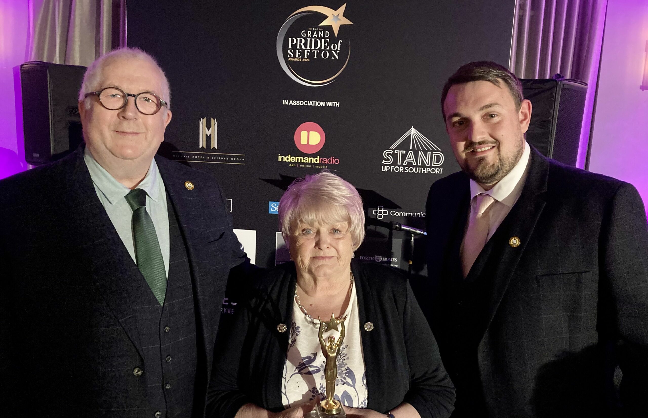 Kath Wilson of Southport Lifeboat (centre) won the main Pride of Sefton Award. She is pictured with Southport Lifeboat treasurer Tony D'Arcy Masters (left) and Southport Lifeboat Coxswain and Press Officer Nick Porter