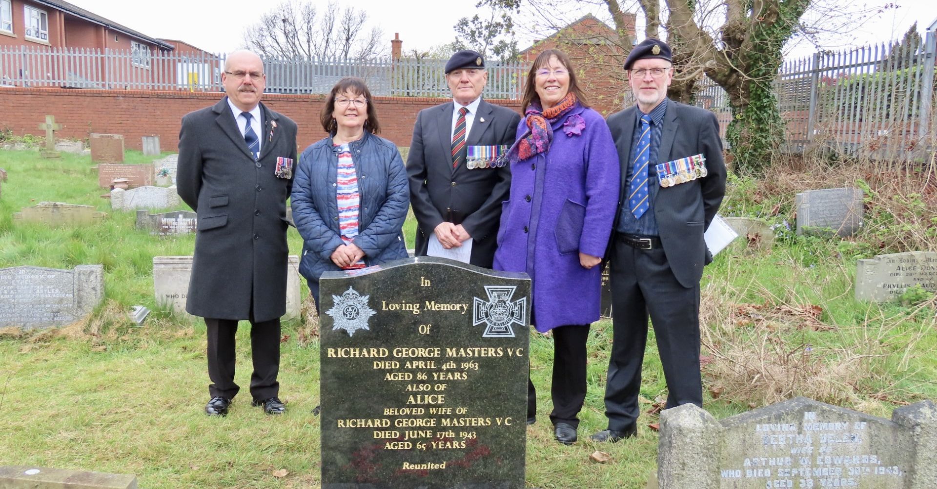 Crowds paid their respects as a new headstone was unveiled in tribute to Private Richard George Masters, from Southport, who was awarded a Victoria Cross when he saved the lives of 200 wounded British Army soldiers on 9th April 1918 during World War One. Fom left: Tony Ravera; Joanne Rich; Rolan Sutton; Judy Masters; and Jon Price. 