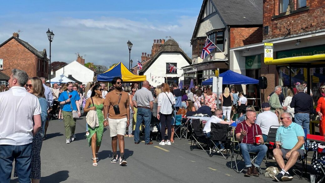 Crowds enjoy the King's Feast Coronation celebration in Churchtown Village in Southport. Photo by Claire Brown of Stand Up For Southport