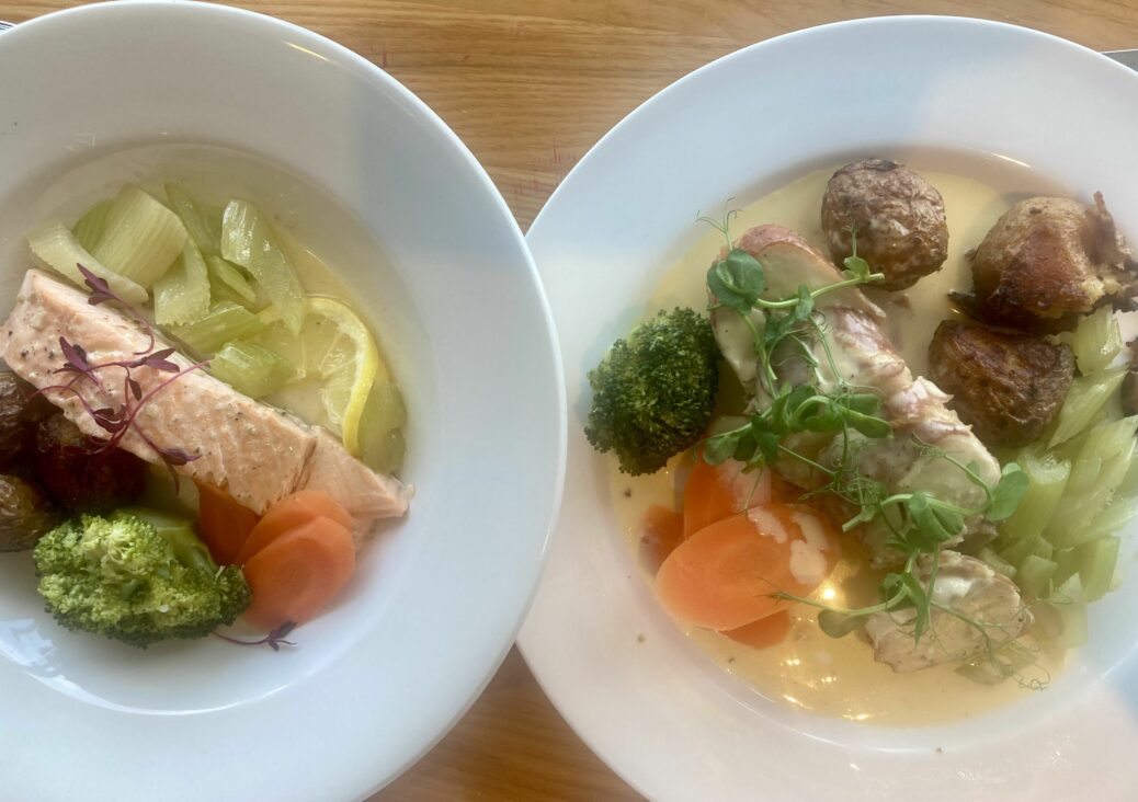 Steamed salmon with a creamy lemon garlic butter and seasonal vegetables plus roasted chicken wrapped in parma ham with seasonal vegetables at Clouds restaurant at Southport College in Southport. Photo by Andrew Brown of Stand Up For Southport
