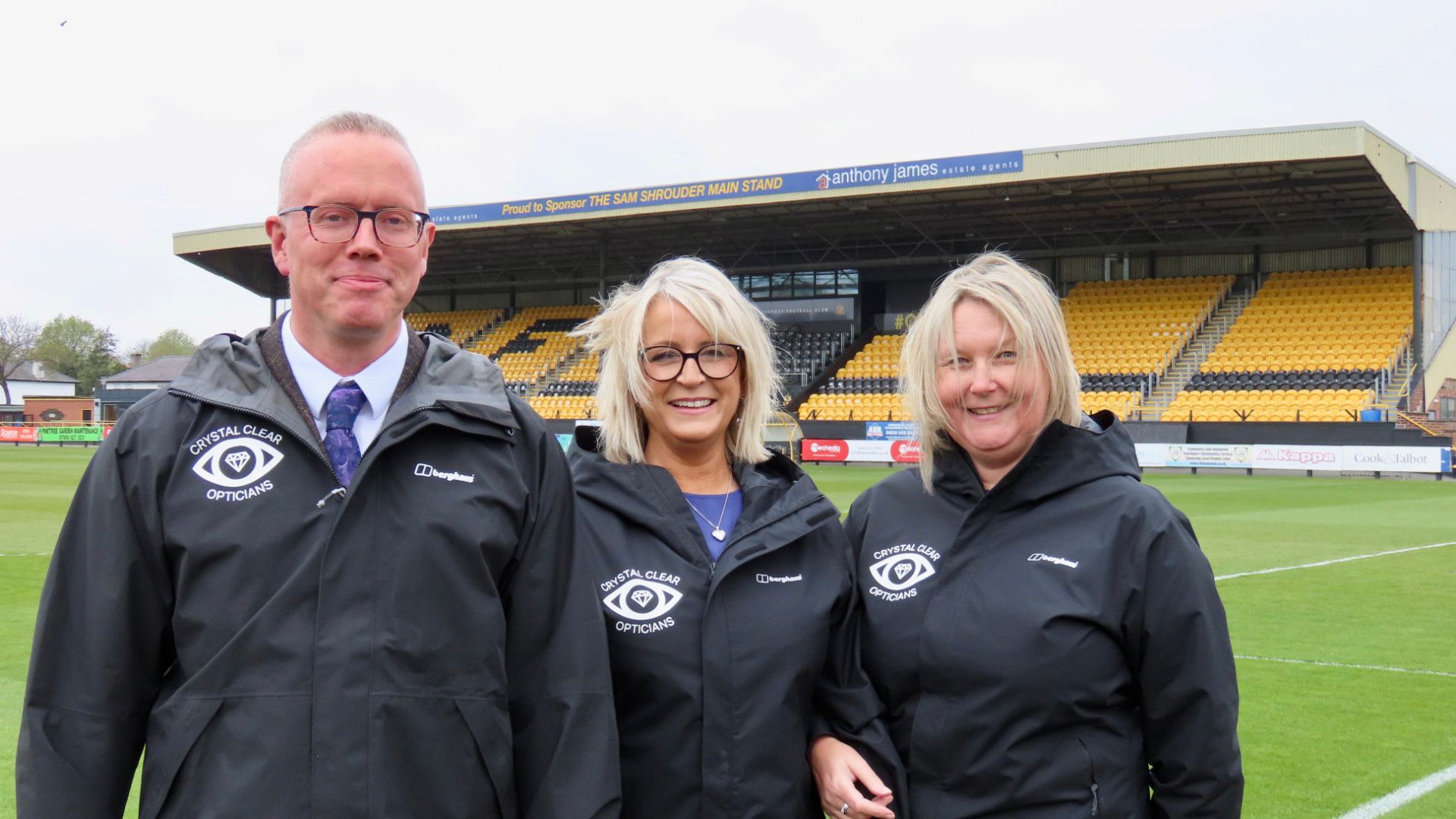 Crystal Clear Opticians in Southport are backing Southport Football Club. Neil Mattack, Paula McKeown and Marta Garrod from Crystal Clear. Photo by Andrew Brown of Stand Up For Southport