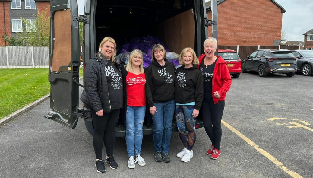 Members of Slimming World in Southport have shown their support for Cancer Research UK through the Big Slimming World Clothes Throw