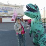 Joanne Caddy and Amanda Bradley were inspired by Jurassic Park to raise funds for Queenscourt Hospice by walking 10 kilometres through the streets of Southport - dressed as an 8ft tall Tyrannosaurus Rex dinosaur and a Jurassic Park Ranger! Photo by Andrew Brown of Stand Up For Southport