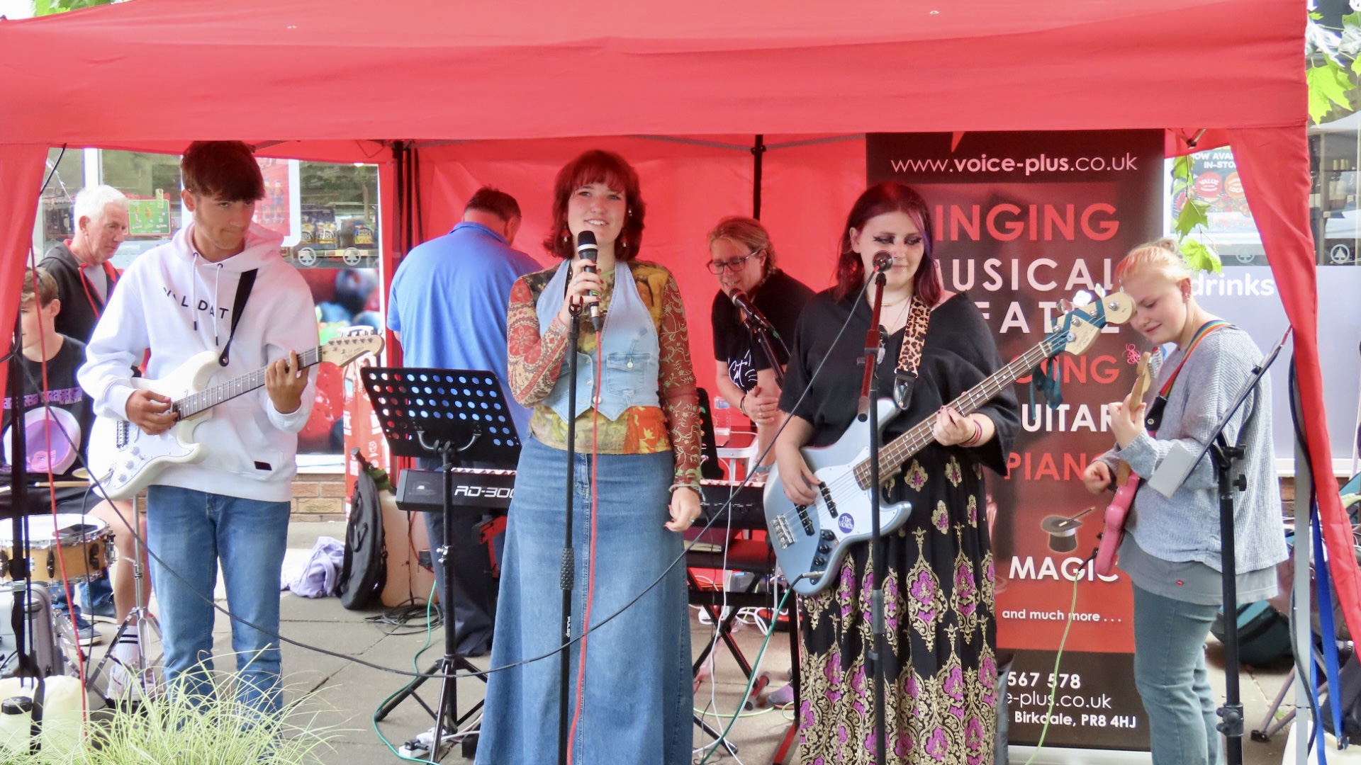 The Violets perform for the crowds at the Birkdale Village Summer Fayre. Photo by Andrew Brown Stand Up For Southport