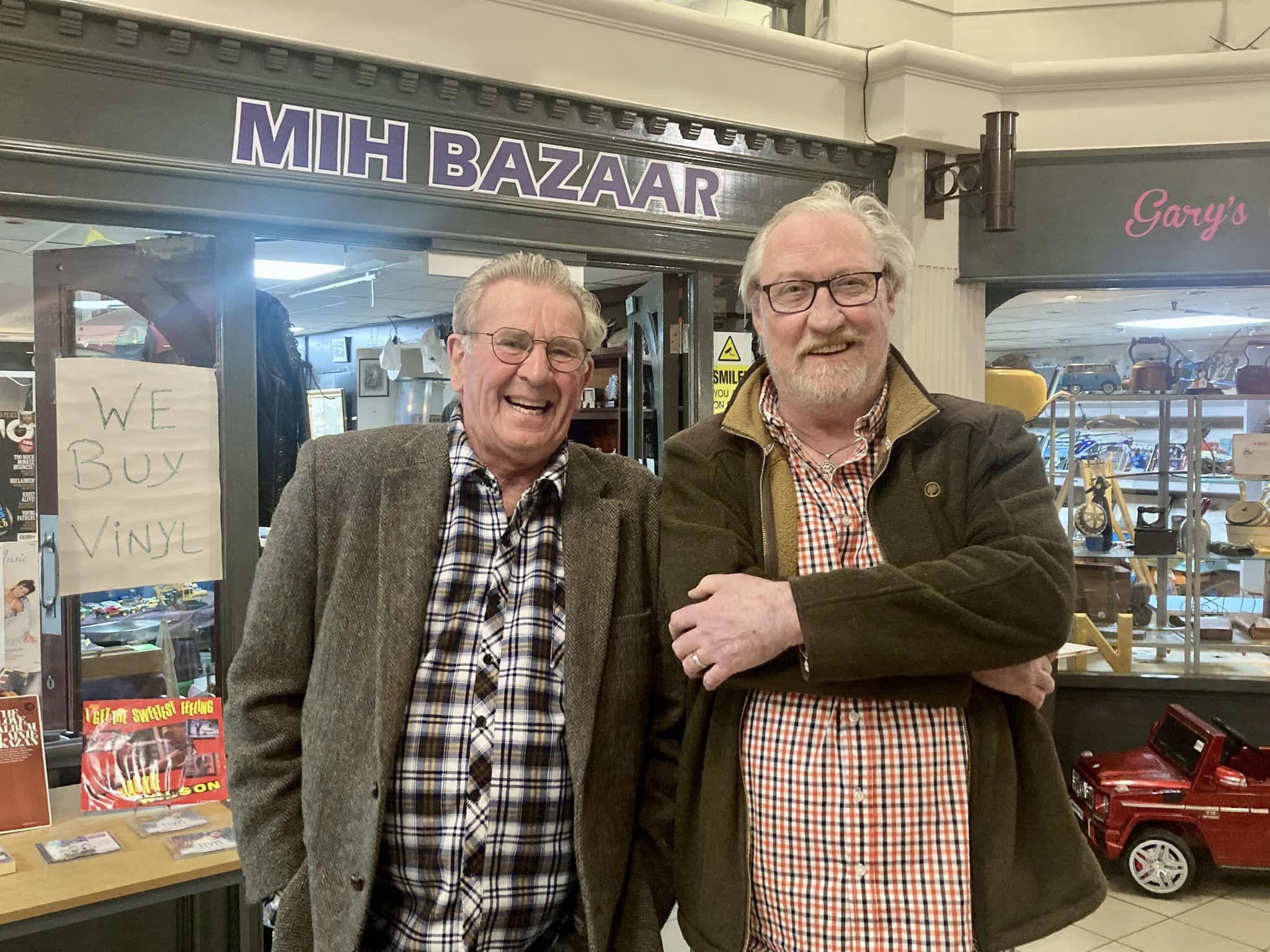 Work is taking place to repair and restore Cambridge Arcade in Southport. John Savage owner of MIH Bazaar (right). Photo by Andrew Brown Stand Up For Southport