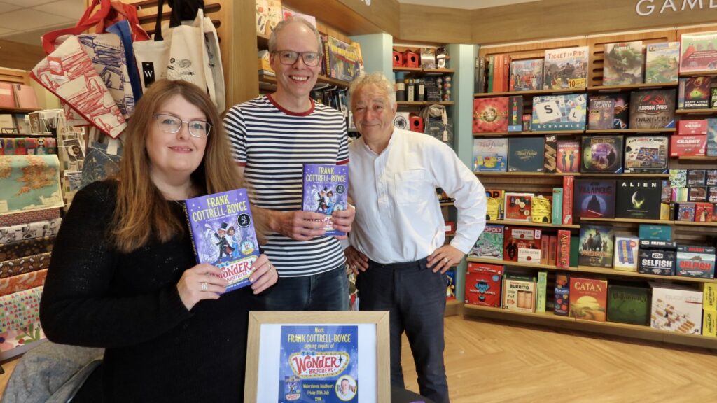 Frank-Cottrell-Boyce called into Waterstones bookshop in Southport to sign copies of his new book, The Wonder Brothers. Frank (right) with Mark Dickens and Emma Legan from Waterstones Southport. Photo by Andrew Brown Stand Up For Southport