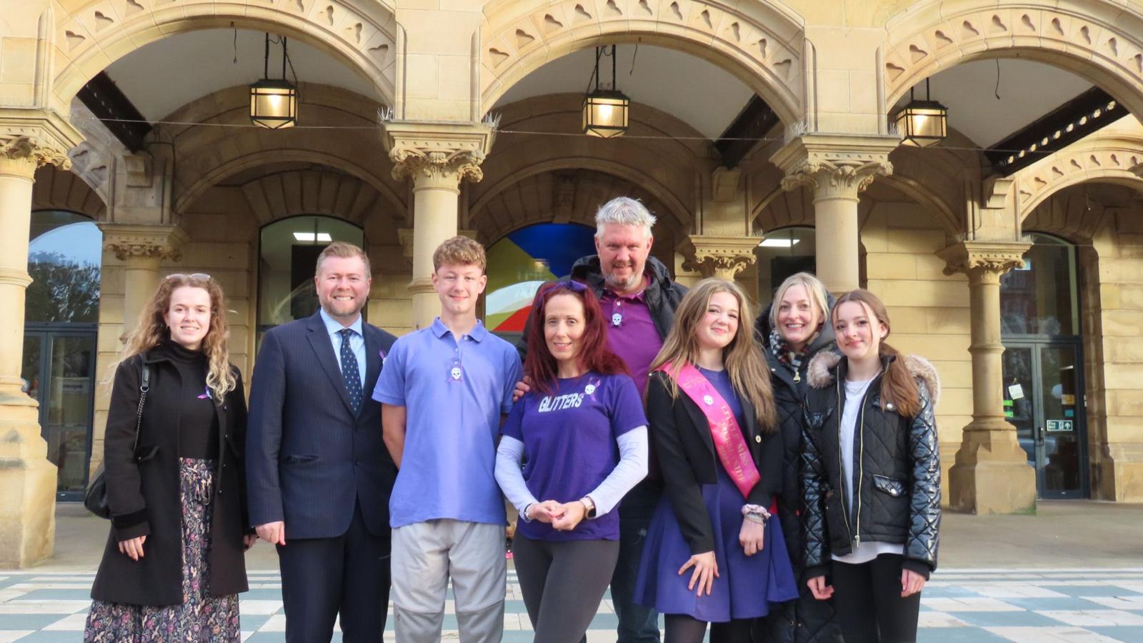 The Atkinson and Southport Town Hall were lit up purple to highlight Craniosynostosis Awareness Month, inspired by Southport schoolboy Eden Barbé. Eden was joined at the event by sister Ebony, Mum Jenny, Southport MP Damien Moore and other supporters. Photo by Andrew Brown Stand Up For Southport 