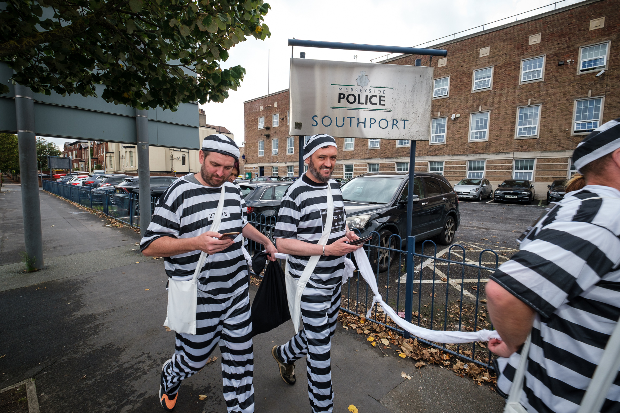 Jail and Bail for Queenscourt Hospice. Daniel Doherty and David Lloyd outside Southport Police Station. 