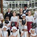 People are being invited to enjoy a very special Victorian Weekend as the historic Wayfarers Shopping Arcade in Southport celebrates its 125th anniversary.Master of Ceremonies Jordan Plunkett and Vesta Tilley with children from the Alison Wright School of Dance and Drama. Photo by Andrew Brown Stand Up For Southport