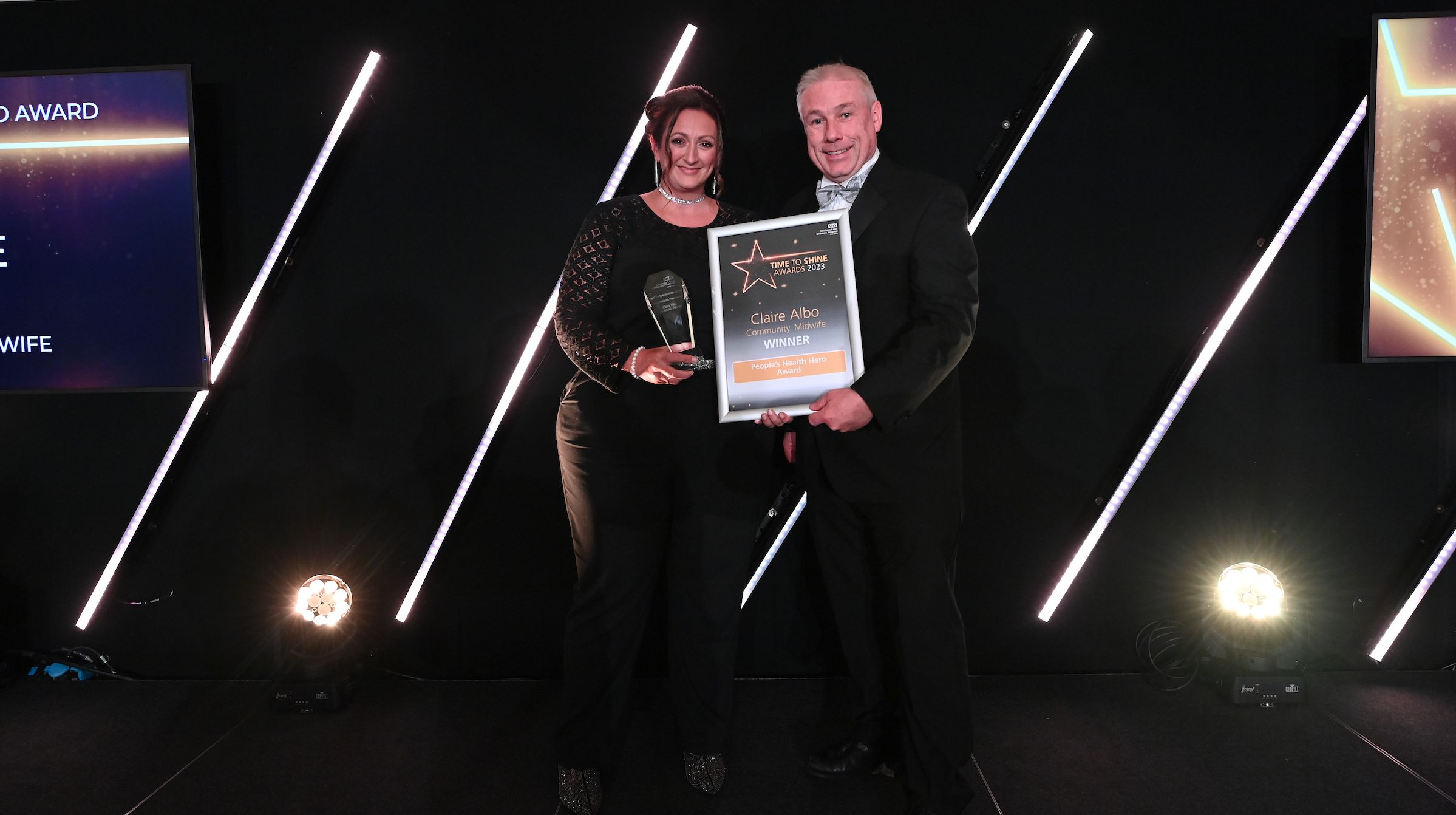 Time To Shine Awards. Claire Albo is presented with the People's Health hero Awards by Stand Up For Southport Director Andrew Brown