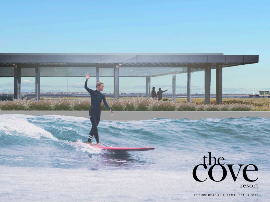 The Cove Resort Southport. A surfer in the lagoon with Southport Pier and Blackpool in the background. Source