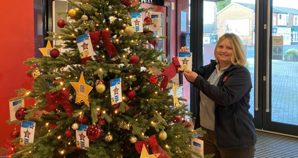 Kathryn Casserley with Southport Salvation Army's Giving Tree which will support children of families struggling with the cost of living this Christmas