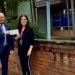 Mick White, Southport Branch Leader of Skipton Building Society is pictured presenting the cheque to Janine Hyland, Chief Executive of Parenting 2000