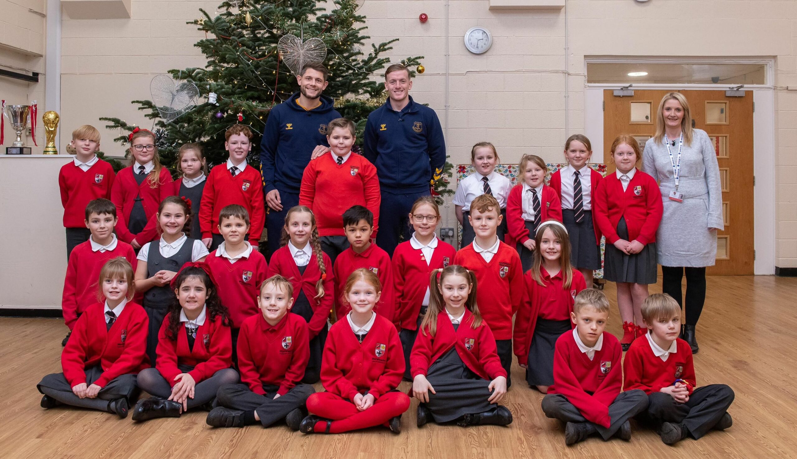 Thomas Ralphs, a pupil at Marshside Primary School in Southport, got an early Christmas treat when two of his Everton FC heroes surprised him midway through a school carol rehearsal. Photo by Everton FC