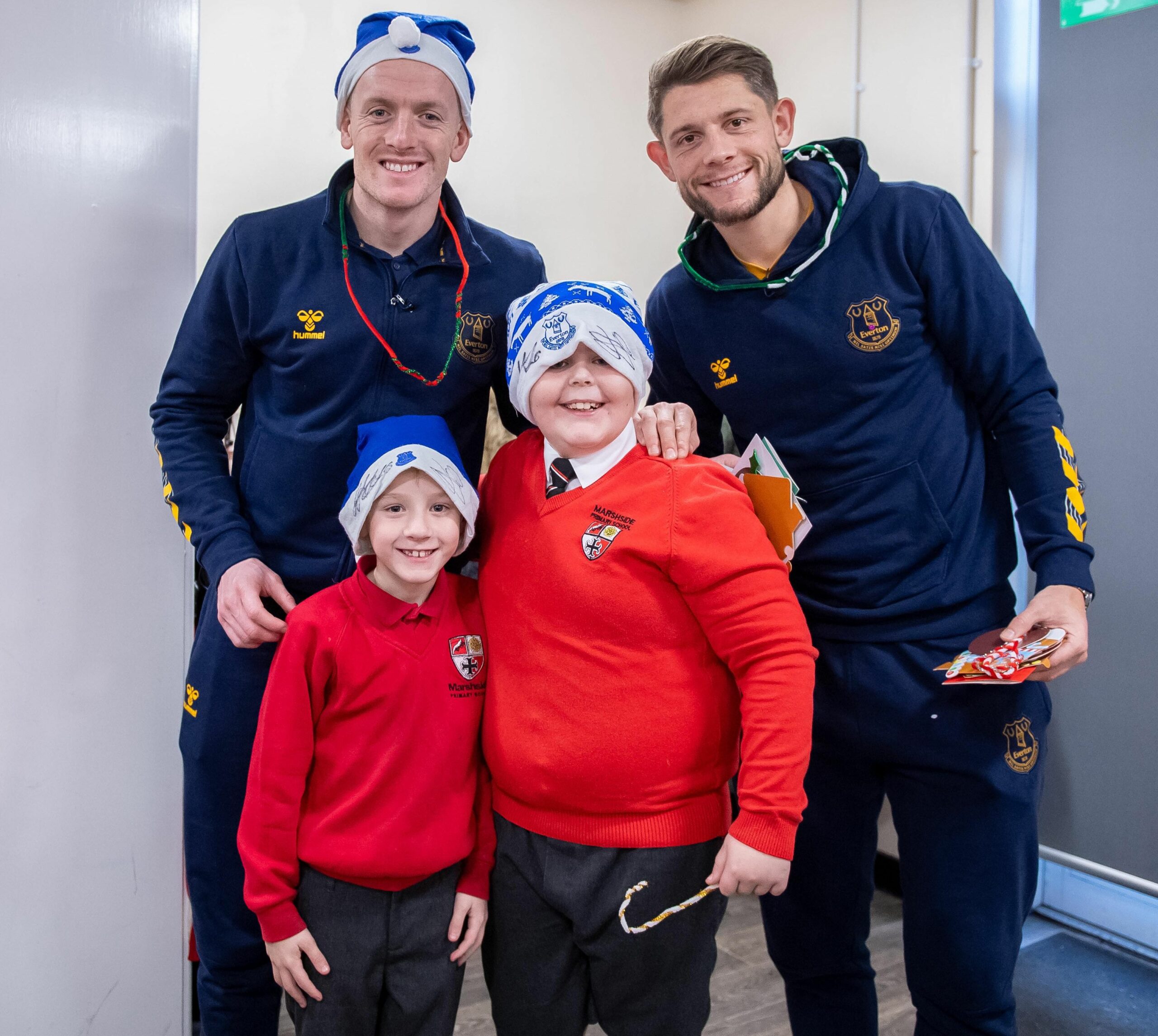Thomas Ralphs, a pupil at Marshside Primary School in Southport, got an early Christmas treat when two of his Everton FC heroes surprised him midway through a school carol rehearsal. Photo by Everton FC