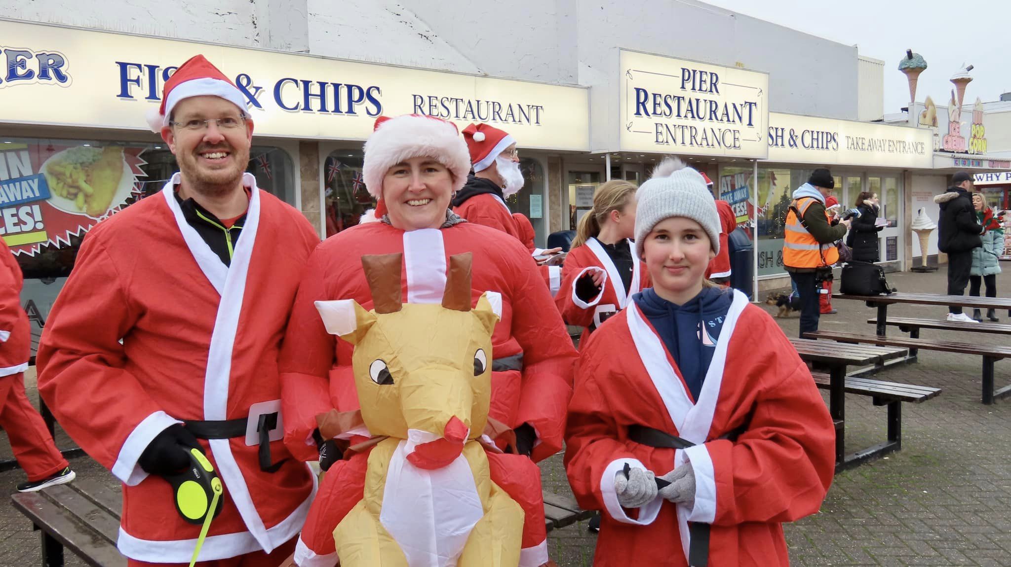 Hundreds of runners took part in the 2023 Southport Santa Sprint for Queenscourt Hospice. Photo by Andrew Brown Stand Up For Southport