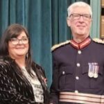 Sally Ralston BEM pictured with the Lord Lieutenant of Liverpool, Mark Blundell. Picture credit Merseyrail