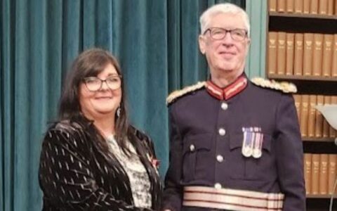 Merseyrail community champion presented with British Empire Medal after £1m support for local communities